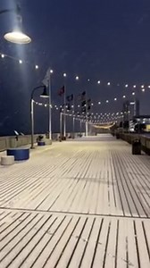 Watch as snow begins to fall on the Myrtle Beach Boardwalk