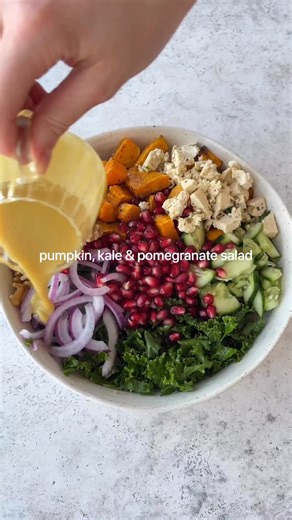 ‘Honey’ mustard salad👇🏼😍 with roasted pumpkin, kale, couscous, cucumber, onion, walnuts, feta and pomegranate. It’s the perfect dish for the holidays! Follow @tessbegg for more recipes! Serves 2 as a main or 4 as a side dish Pumpkin: 600g butternut pumpkin, peeled and diced Olive oil Salt and pepper Couscous: 1/2 cup dry couscous 3/4 cup boiling water or vegetable stock Kale: 2-3 cups finely chopped kale 1/2 lemon, juiced 1-2 tsp olive oil Pinch of salt ‘Honey’ mustard dressing: 2 tbsp dijon