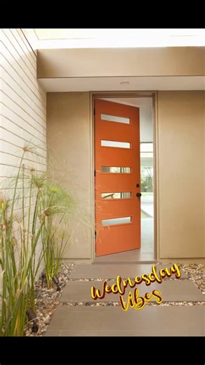 李李李李 An orange front door is often seen as a sign of warmth,...