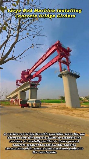 Large Red Machine Installing Concrete Bridge Girders