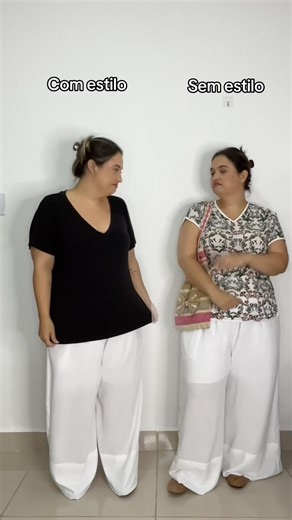 Stylish plus-size outfit idea: white wide-leg pants and a long black top #plussize