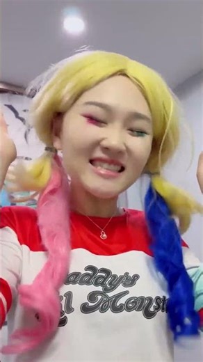 What game is Harley Quinn playing?