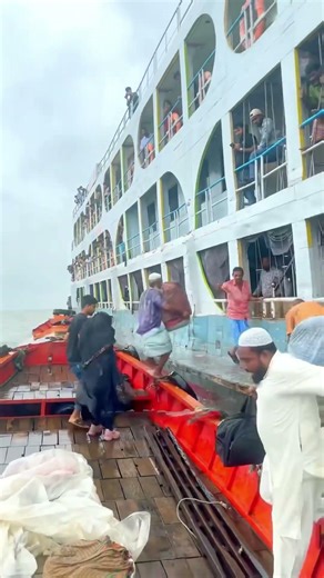 Hawkers boarding a super fast moving ferry