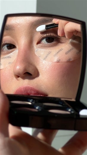 CHANEL BEAUTY Community on Instagram: "Low-lift makeup. @oliviasui smooths and preps in one step with LE LIFT FLASH EYE, the chicest CHANEL eye patches that firm, tighten and brighten eyes in five minutes (plus, they catch any eyeshadow fallout!) #welovecoco — LE LIFT FLASH EYE"