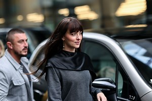 Dakota Johnson attends the Kering Foundation's Caring for Women dinner