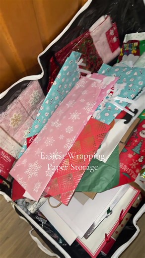The easiest way to store gift wrapping paper is in this Christmas gift wrap organizer! So easy #organizedhome #organization #giftwraporganization #wrappingpaperorganization #tiktokshopcreatorpicks