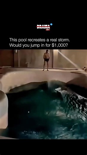 This pool recreates a real storm. Would you jump in for $1000 #shorts