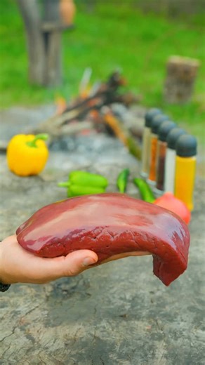 Wilderness cuisine | When liver sizzles on the pan, even the mountains taste the flavor 🔥🥩Mountain air, open fire, and pan-fried liver cooked the old-school way... | Instagram