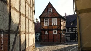Residential buildings of the old city in Europe. Traditional architecture half-timbered houses. Old German small tourist town. Medieval city. Travel.