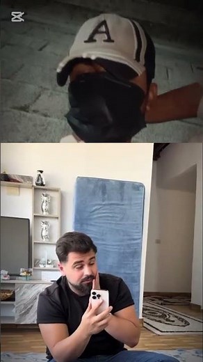 One man is watching a video on mobile while the other man slaps him from behind#funny#duet#mobile#sh