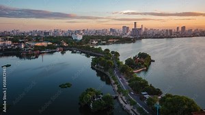 Hanoi, Vietnam, time lapse view of Hanoi skyline showing West Lake and Tay Ho District at sunset.