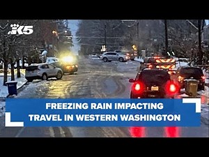 Freezing rain causes power outages, road closures, flight delays in western Washington
