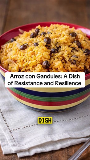 Arroz con Gandules: A Dish of Resistance and Resilience Arroz con Gandules Banned During Slavery Pigeon Peas from Africa Hidden Gardens Afro-Puerto Rican Resilience National Dish Resistance on a Plate #ArrozConGandules #PuertoRico #AfroPuertoRican #FoodIsResistance #PuertoRicanCuisine