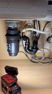 clearing a clogged kitchen sink & installing a new garbage disposal | Evan Berns