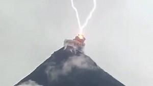 Lightning strikes erupting volcano