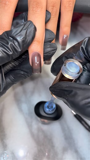 Riya Thai on Instagram: "Icy Aurora blue ❄️🥶 Using #RIYA Products: - Aurora Crystal Cateye #04 - Tint gel #T14 - Water decal white airbrush - Medium Square tips - Extend gel glue -rubber base coat - glossy top coat"