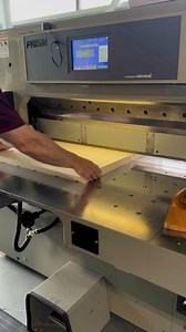 Behind every perfect print is a powerful cutter. The bigger the paper, the bigger the blade—watch as these sheets are precision-cut to perfection! ✂️ #papercutting | LCI Paper