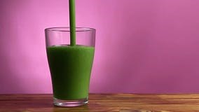 Green Detox Smoothie is Pouring in the Glass Stock Footage - Video of meal, blended: 166243004