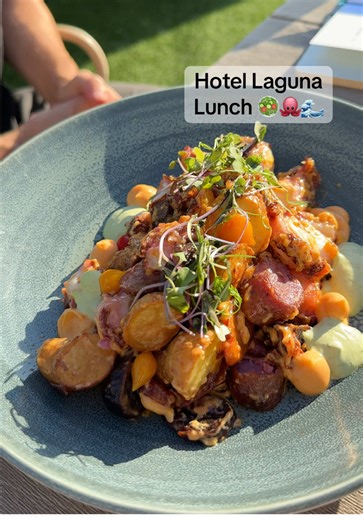 Enjoy Beach Views at Hotel Laguna's Octopus & Caesar Salad