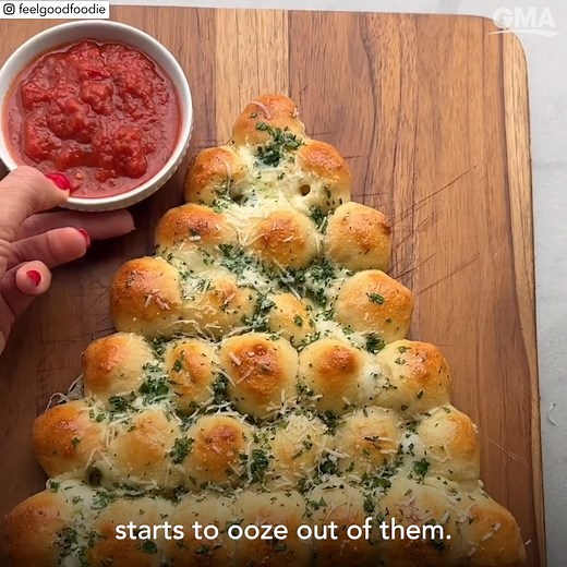 Need an easy, cheesy holiday appetizer? Look no further than this pull-apart mozzarella string cheese Christmas tree bread! Find the recipe here: gma.abc/3vbFzFd | Good Morning America