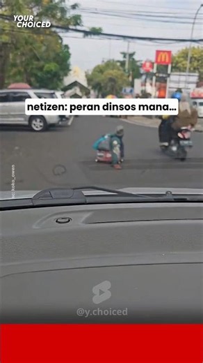 Driver Highlights Safety Concerns for Elderly Woman Struggling to Cross the Road