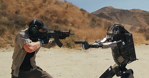 CGI Video Shows Military Robot Flipping a Table of Guns