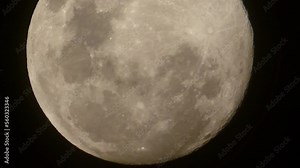 Timelapse video of the moon slowly moving across the night sky. Zoomed in close enough to see craters. Recorded using a Panasonic Lumix FZ80 camera.