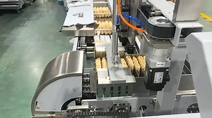 The fully automatic instant noodle processing line automatically sorts and arranges instant noodle cakes, arranging individual cakes into 5 or 10 packs, and automatically entering the family packaging machine to achieve automated operation, saving a lot of labor and improving efficiency. We provide a complete set of instant noodle packaging systems, including instant noodle single pack packaging machines, material sorting machines, and family bag packing machines. #sortingmachine #sorter #noodle