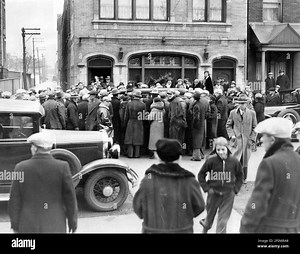 A crowd gathers in front of Sadowski Funeral home at 1845 N. Hermitage Ave. in Chicago for the funeral for George "Baby Face" Nelson on Dec. 1, 1934. (Photo by John Steger/Chicago Tribune/TNS/Sipa USA Stock Photo - Alamy