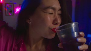 Woman Having Fun Dancing And Drinking Alcohol At House Party | Free Stock Video Footage