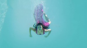 Brunette in Evening Gown Diving into Swimming Pool Stock Video - Video of highdef, bright: 43413005