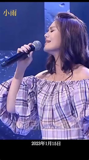 Dynamic Stage Performance by Female Artist