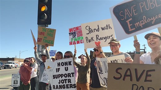 Demonstrators are showing support for Joshua Tree National Park rangers and opposition to park layoffs today at Park Boulevard and Twentynine Palms Highway in Joshua Tree. | Hi-Desert Star