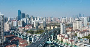 time lapse of the overpass at the intersection of two viaducts, city interchange bridge on traffic rush hour in shanghai, China