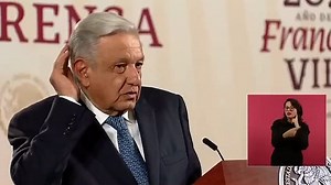 Moment Mexico's president ignores reporters and starts cracking jokes