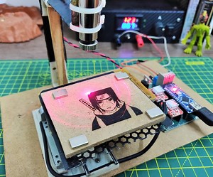 Mini CNC Laser Wood Engraver and Laser Paper Cutter.