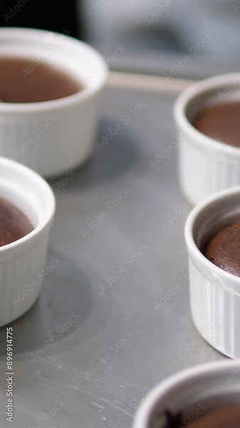 chocolate fondant making process. Step by step mixing ingredients close up Cooking chocolate fondant, pouring into molds, process