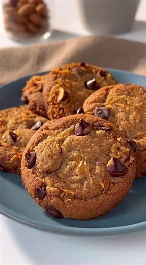 🍪✨ Air Fryer Almond Joy Cookies 😋🥥 Chewy, chocolatey cookies with almonds and coconut, made quick and easy in your air fryer, perfect for snack time or dessert! Prep Time: 10 mins | Cooking Time: 8 mins | Total Time: 18 mins | Kcal: 150 | Servings: 12 cookies Ingredients: 1/2 cup unsweetened shredded coconut 1/4 cup all‑purpose flour 1/4 cup powdered sugar 1/8 teaspoon salt 1/4 cup roasted whole almonds, roughly chopped (about 1 oz) 1/4 cup mini chocolate chips (about 1.5 oz) 1 large egg whit