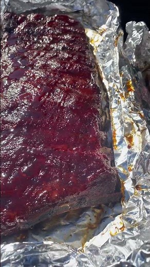 Hot honey, glazed rack of ribs smoked using Applewood pellets on a Traeger Woodridge pro #Ribs #bbq