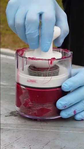 Me Packing a Wheel Bearing Using Lisle Handy Packer Bearing Packer