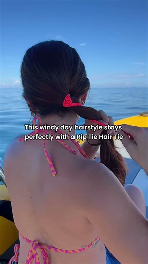 This windy day hairstyle stays perfectly with a Rip Tie Hair Tie