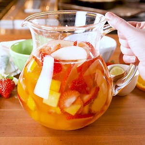 There's an ENTIRE bottle of wine in this White Sangria 😍 Full recipe: http://dlsh.it/hzbFRjJ | Delish