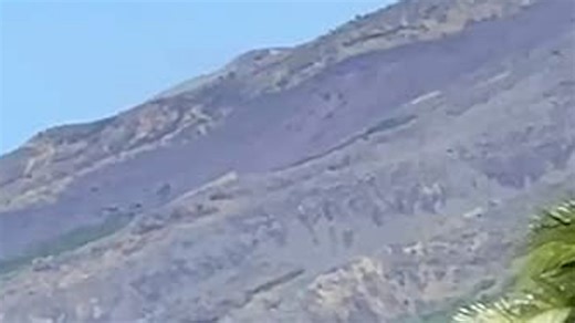 Mayon Volcano ravaged by lava flows carving gullies on its slopes