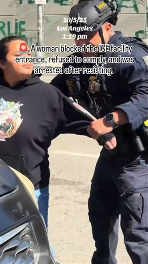 Real News on Instagram: "Law Enforcement in Action‼️ Watch the powerful moment when DHS officers professionally handled a situation outside Los Angeles' Metropolitan Detention Center. A woman blocked the ICE facility entrance, refused to comply, and was arrested after resisting. This footage showcases the dedication of our law enforcement to maintain order and protect federal operations amidst national tensions. #ICE #LADetentionCenter #ICEArrest #Immigration"