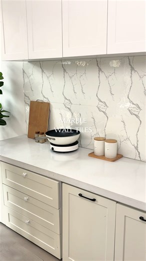 Temu Official | 🏡 Luxe vibes on a budget! These peel-and-stick marble tiles give your space an instant glow-up—no mess, no stress. ✨ 🔍 Find it at... | Instagram