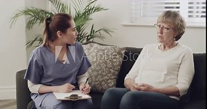 Old woman, consulting or nurse writing notes for healthcare history for cancer therapy or wellness. Help, elderly lady or sick patient talking to caregiver in consultation for medical prescription