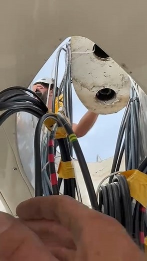 The team guiding the mast smoothly through the deck collar is a precise and critical stage in any rig pull or re-stepping operation. Every millimetre matters as the alignment is checked, tensions balanced, and the spar is safely seated. Skilled coordination between deck and crane teams ensures the process runs seamlessly, with full control from start to finish. #RSBRigging #SuperyachtRigging #YachtRigging #MastStepping #Rigging #Palma #Superyacht | RSB Rigging Solutions