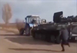 Ukraine Farmer 'Steals' A Russian Tank Using His Tractor | Sean Hannity