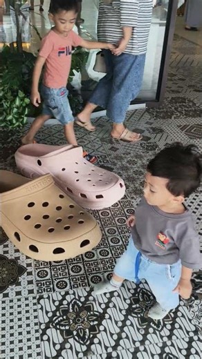 This child bought size 100 flip flops