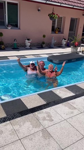 Playful Pool Interactions: Swimming Fun with Friends